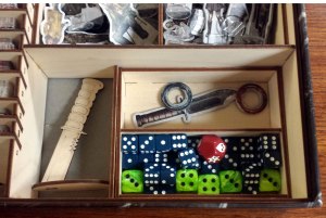 Nothing to see here but a couple knives and some cool looking dice, fit all nice and snug in the box.